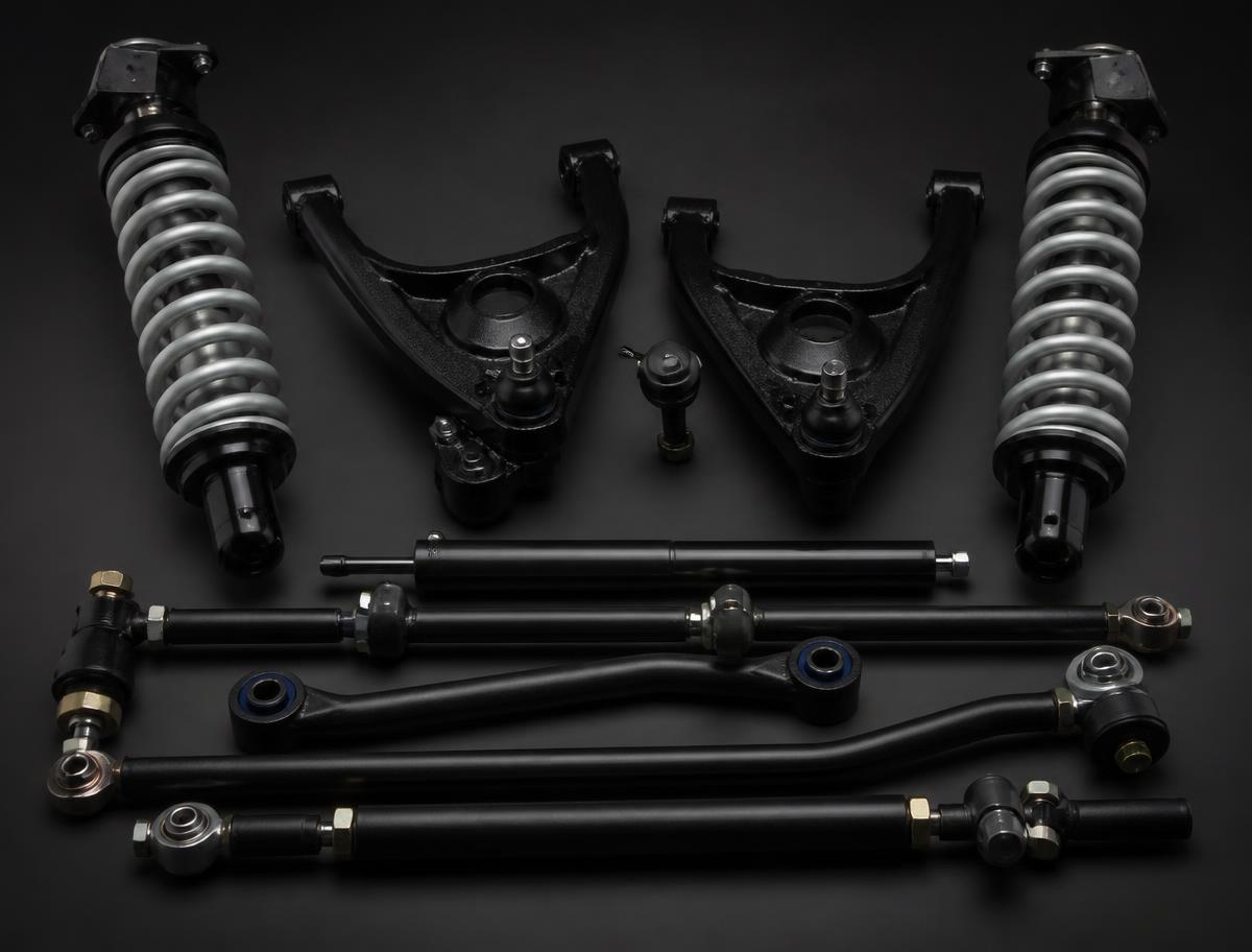 Heavy-duty suspension and steering kit with coilovers, control arms, tie rods, steering stabilizer and traction bars